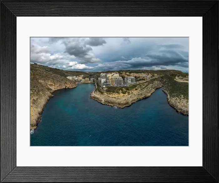 Framed Print : Drone view of Xlendi village and bay on Gozo Island in Malta Framed Print : Drone view of Xlendi village and bay on Gozo Island in Malta