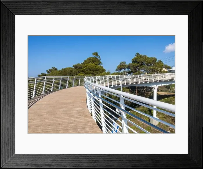 Framed Print : A modern pedestrian bridge over the highway from the Technion University to the nature reserve Framed Print : A modern pedestrian bridge over the highway from the Technion University to the nature reserve