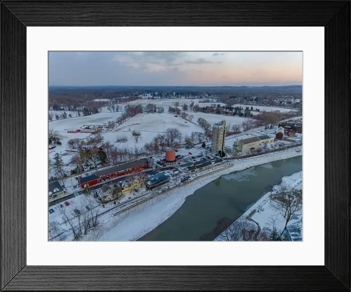 Framed Print : Early evening winter aerial photo of Schoen Place and the Erie Canal in the Village of Pittsford, New York. (01-14-2024) Framed Print : Early evening winter aerial photo of Schoen Place and the Erie Canal in the Village of Pittsford, New York. (01-14-2024)