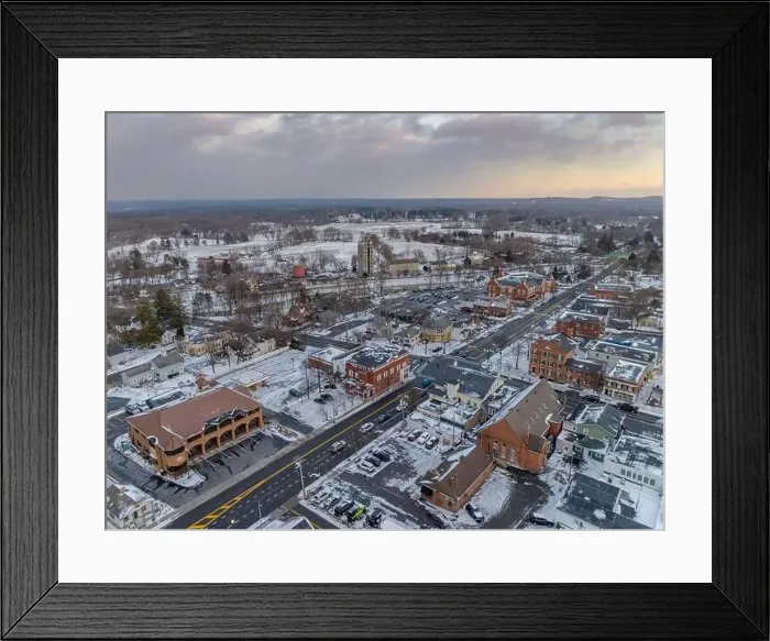 Framed Print : Early evening winter aerial photo of the four corners in the Village of Pittsford, New York. (01-14-2024) Framed Print : Early evening winter aerial photo of the four corners in the Village of Pittsford, New York. (01-14-2024)