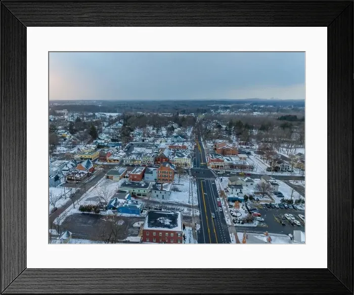 Framed Print : Early evening winter aerial photo of the four corners in the Village of Pittsford, New York. (01-14-2024) Framed Print : Early evening winter aerial photo of the four corners in the Village of Pittsford, New York. (01-14-2024)