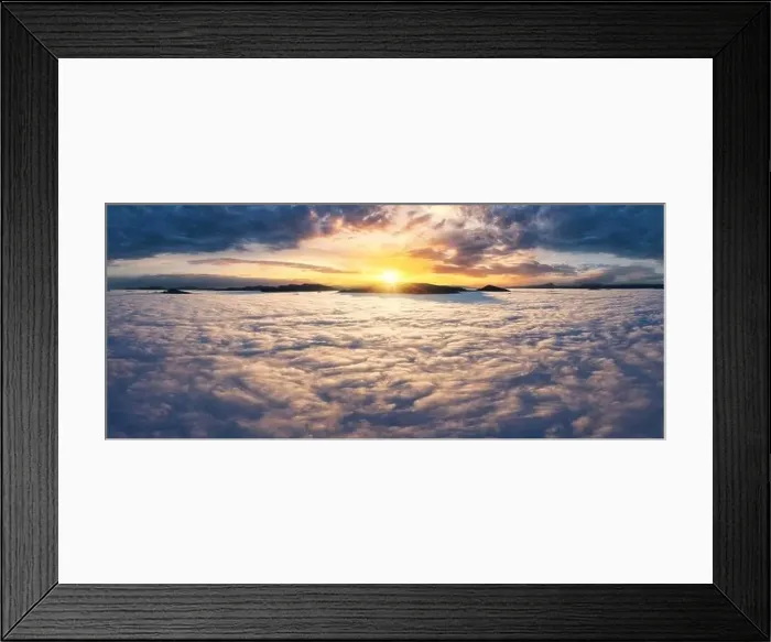 Framed Print : Beautiful sunset sky above the clouds with silhouettes of mountain peaks with dramatic light. Aerial drine view Framed Print : Beautiful sunset sky above the clouds with silhouettes of mountain peaks with dramatic light. Aerial drine view