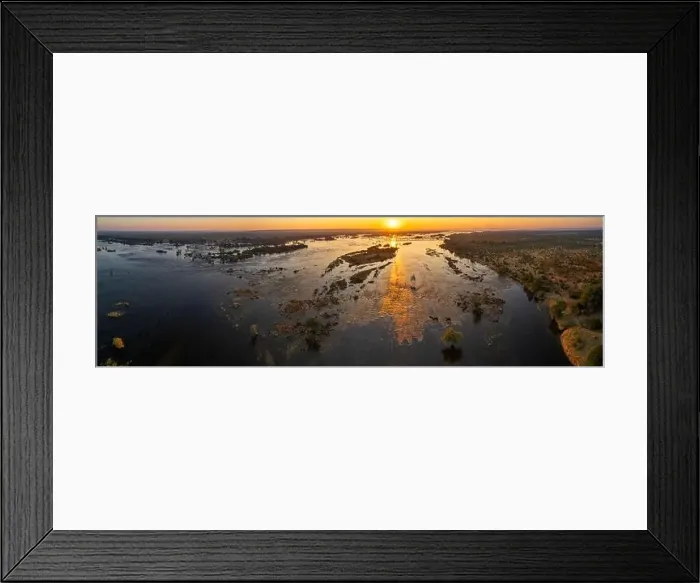 Framed Print : A dramatic aerial perspective of the Zambezi river in Zimbabwe's Zambezi National Park Framed Print : A dramatic aerial perspective of the Zambezi river in Zimbabwe's Zambezi National Park