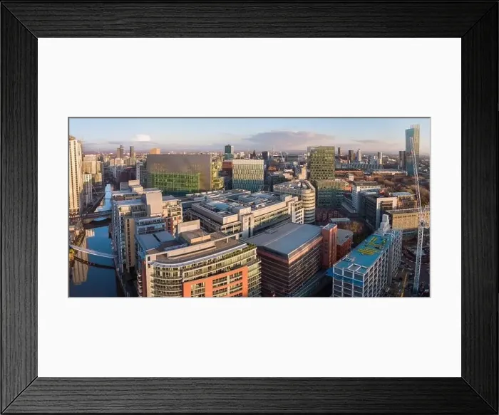 Framed Print : Panoramic drone image of Spinningfields and the River Irwell in Manchester city centre at golden hour Framed Print : Panoramic drone image of Spinningfields and the River Irwell in Manchester city centre at golden hour