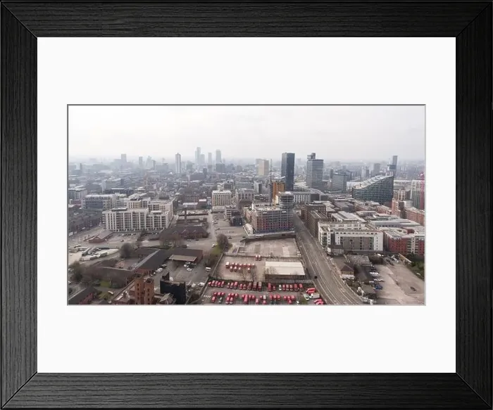 Framed Print : Panoramic aerial photograph of a hazy Manchester city centre, UK taken from the east looking west Framed Print : Panoramic aerial photograph of a hazy Manchester city centre, UK taken from the east looking west