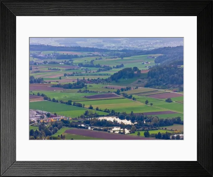Framed Print : Aerial view of green landscape of Zurich in the winter, Switzerland Framed Print : Aerial view of green landscape of Zurich in the winter, Switzerland