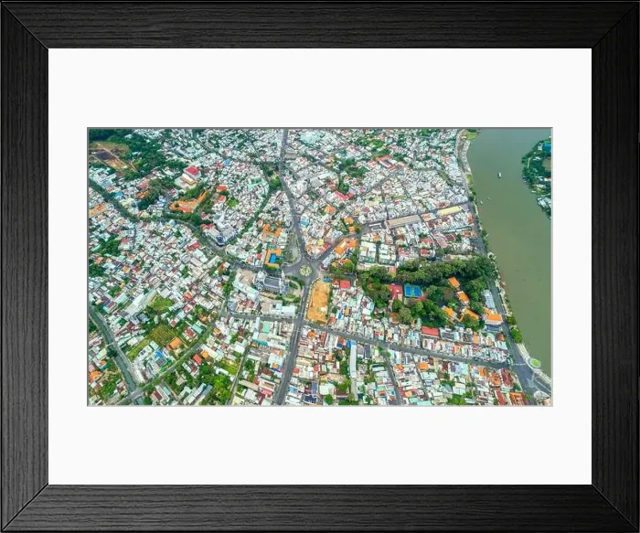 Framed Print : Thu Dau Mot city, Binh Duong Province, Vietnam, aerial view. This is a newly formed city in Southeast region of Vietnam Framed Print : Thu Dau Mot city, Binh Duong Province, Vietnam, aerial view. This is a newly formed city in Southeast region of Vietnam