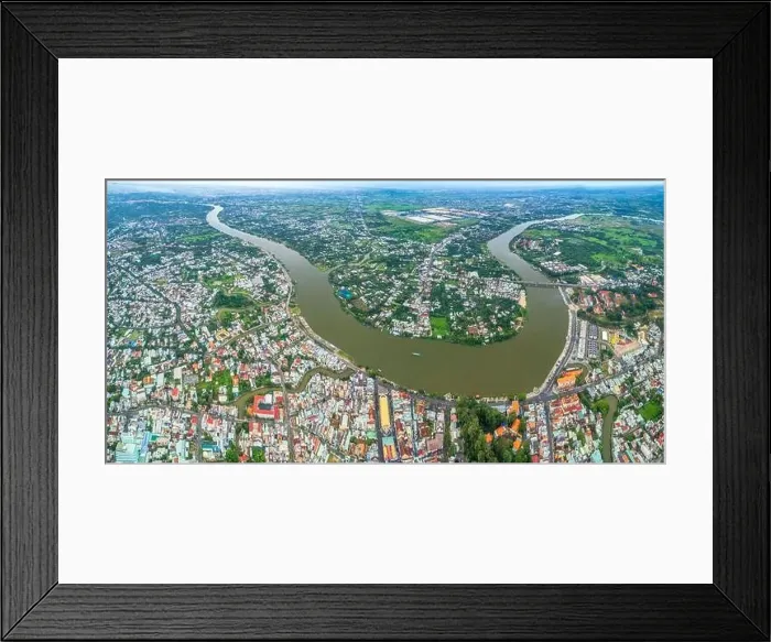 Framed Print : Thu Dau Mot city, Binh Duong Province, Vietnam, aerial view. This is a newly formed city in Southeast region of Vietnam Framed Print : Thu Dau Mot city, Binh Duong Province, Vietnam, aerial view. This is a newly formed city in Southeast region of Vietnam