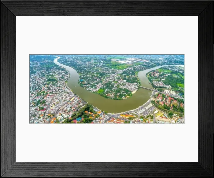 Framed Print : Thu Dau Mot city, Binh Duong Province, Vietnam, aerial view. This is a newly formed city in Southeast region of Vietnam Framed Print : Thu Dau Mot city, Binh Duong Province, Vietnam, aerial view. This is a newly formed city in Southeast region of Vietnam