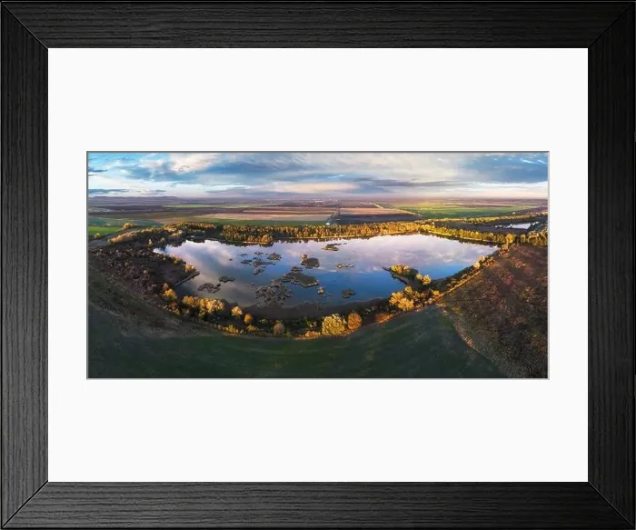 Framed Print : Forest Lake at sunset. Wild Lake in swamp, drone view. Rural landscape with lakes. Forest at bog Framed Print : Forest Lake at sunset. Wild Lake in swamp, drone view. Rural landscape with lakes. Forest at bog