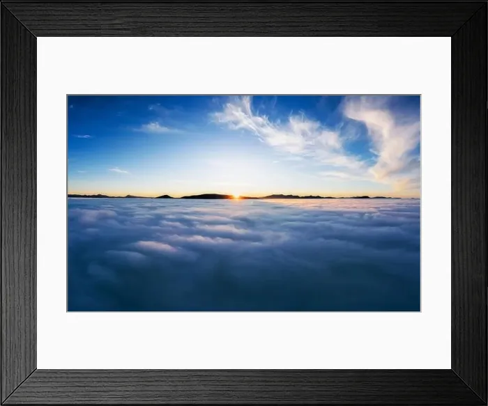 Framed Print : Thick clouds over the mountains at dawn from aerial view Framed Print : Thick clouds over the mountains at dawn from aerial view