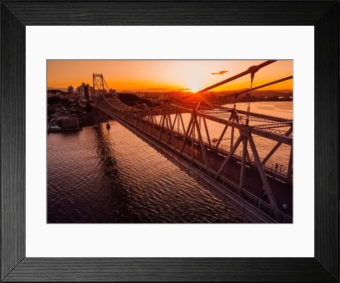 Framed Print : Hercilio luz cable bridge with sunset light in Florianopolis, Brazil. Aerial view Framed Print : Hercilio luz cable bridge with sunset light in Florianopolis, Brazil. Aerial view