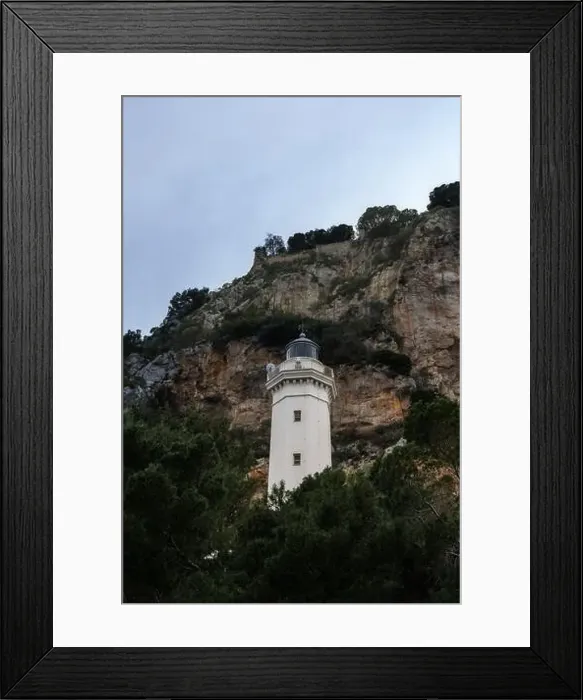Framed Print : A view of the Cefalu Lighthouse and rocky cliffs in the background Framed Print : A view of the Cefalu Lighthouse and rocky cliffs in the background