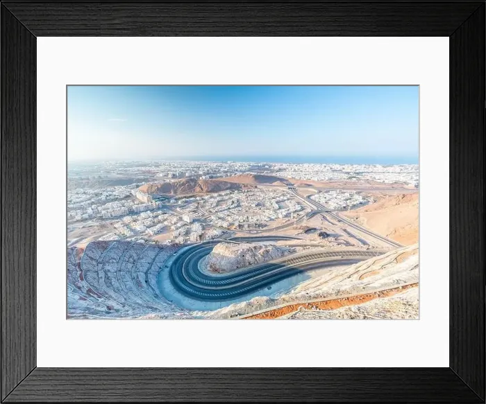 Framed Print : View from Amirat view point on wavy road in Muscat in day time Framed Print : View from Amirat view point on wavy road in Muscat in day time
