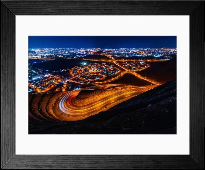 Framed Print : View from Amirat view point on wavy road in Muscat at night Framed Print : View from Amirat view point on wavy road in Muscat at night