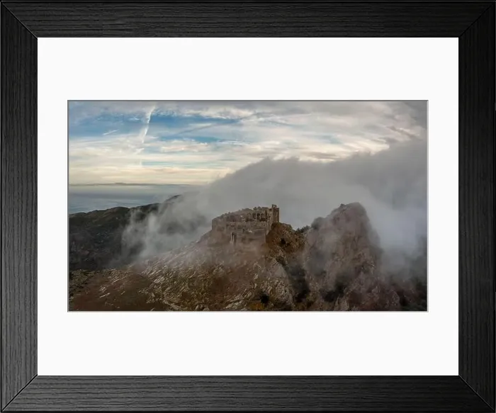 Framed Print : Drone view of the Castello del Volterraio shrouded in morning fog and cloud Framed Print : Drone view of the Castello del Volterraio shrouded in morning fog and cloud