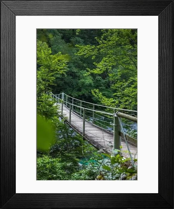 Framed Print : Suspension bridge in Soca valley over Soca river in Slovenia Framed Print : Suspension bridge in Soca valley over Soca river in Slovenia
