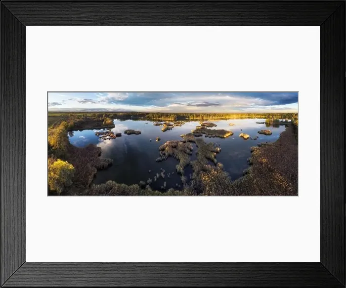 Framed Print : A drone photo of lake - pond bog with sun - Absolutely stunning aerial landscape sunset panorama Framed Print : A drone photo of lake - pond bog with sun - Absolutely stunning aerial landscape sunset panorama