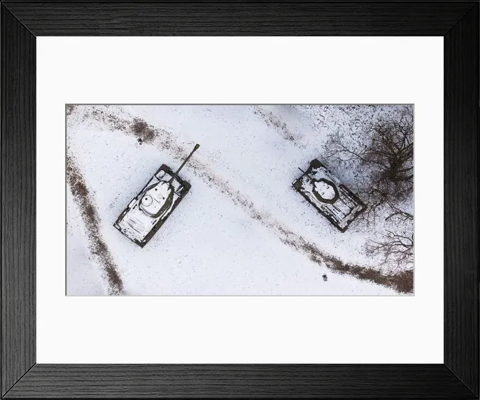 Framed Print : Aerial view of snow-clad tanks in Pozna Framed Print : Aerial view of snow-clad tanks in Pozna