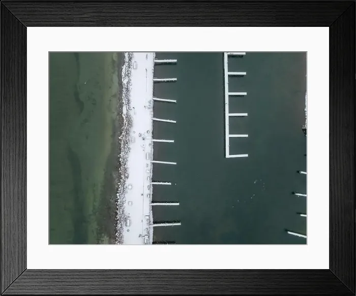 Framed Print : Winter afternoon aerial images of docks in Lansing, NY, on the east side of Cayuga Lake Framed Print : Winter afternoon aerial images of docks in Lansing, NY, on the east side of Cayuga Lake