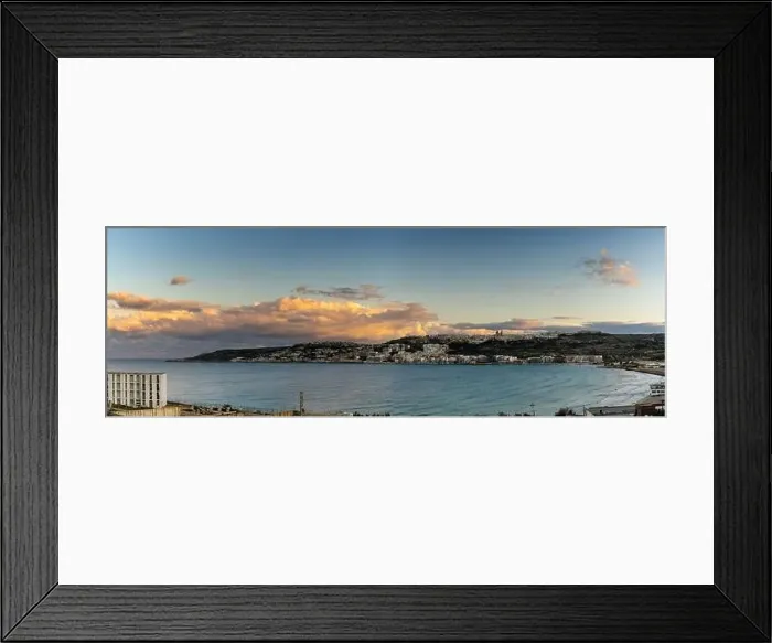 Framed Print : A panorama landscape view of Mellieha Bay in Malta at sunset Framed Print : A panorama landscape view of Mellieha Bay in Malta at sunset