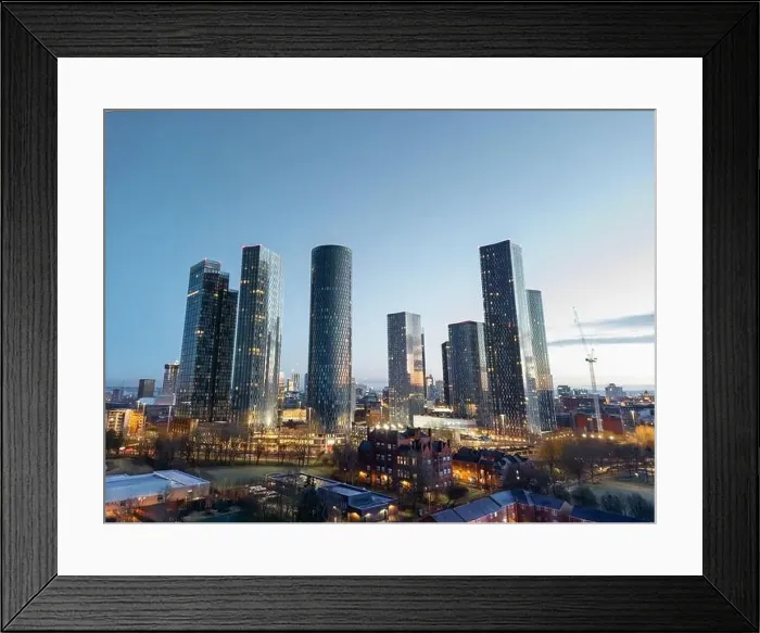 Framed Print : Aerial of Deansgate Square Manchester UK in the blue zone just before sunrise.Deansgate Square South Tower Framed Print : Aerial of Deansgate Square Manchester UK in the blue zone just before sunrise.Deansgate Square South Tower