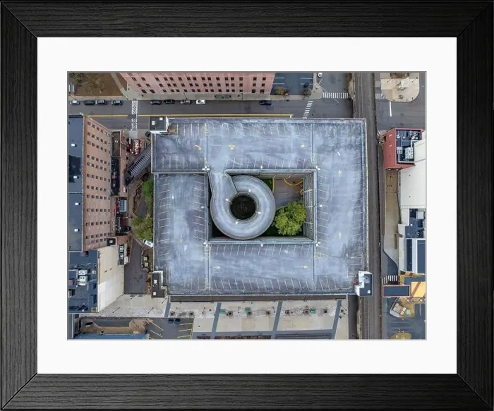 Framed Print : Elmira, NY, USA - 03-02-2024 - Winter aerial image of the downtown parking garage in the City of Elmira Framed Print : Elmira, NY, USA - 03-02-2024 - Winter aerial image of the downtown parking garage in the City of Elmira