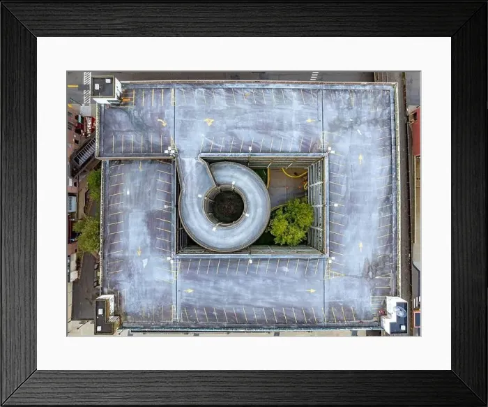 Framed Print : Elmira, NY, USA - 03-02-2024 - Winter aerial image of the downtown parking garage in the City of Elmira Framed Print : Elmira, NY, USA - 03-02-2024 - Winter aerial image of the downtown parking garage in the City of Elmira
