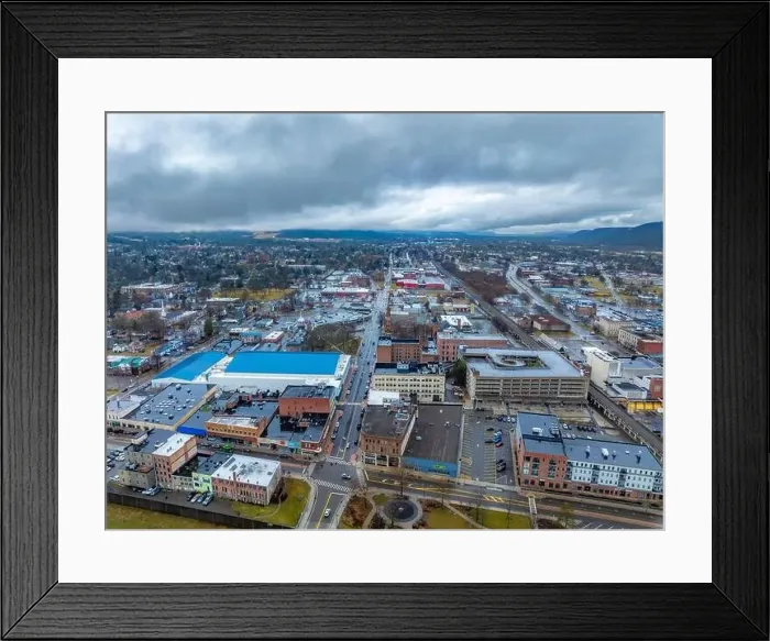 Framed Print : Elmira, NY, USA - 03-02-2024 - Cloudy winter aerial image of the downtown area in the City of Elmira Framed Print : Elmira, NY, USA - 03-02-2024 - Cloudy winter aerial image of the downtown area in the City of Elmira