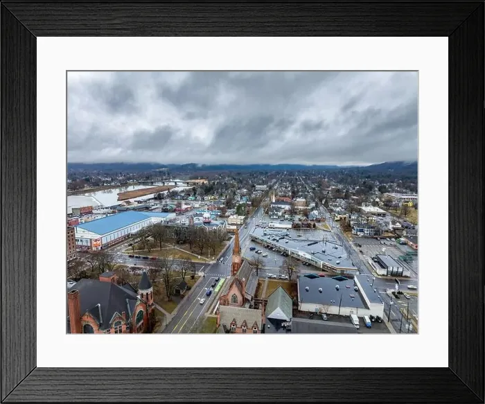 Framed Print : Elmira, NY, USA - 03-02-2024 - Cloudy winter aerial image of the downtown area in the City of Elmira