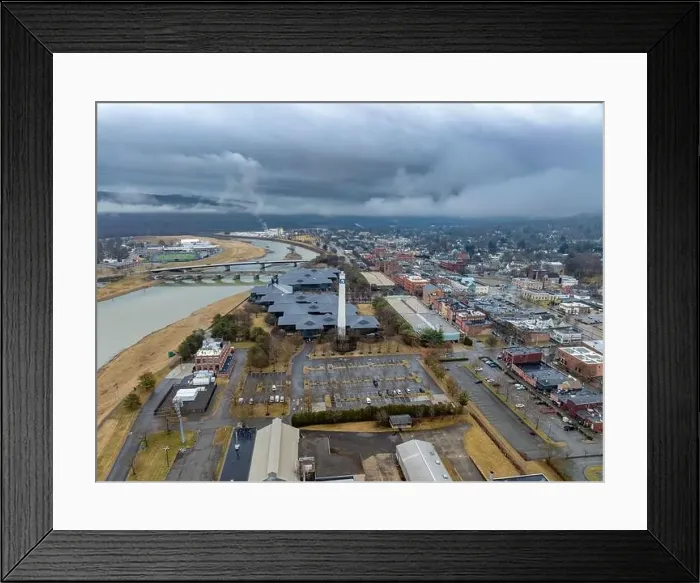 Framed Print : Corning, NY, USA - 03-02-2024 - Cloudy winter aerial image of the downtown area in the City of Corning