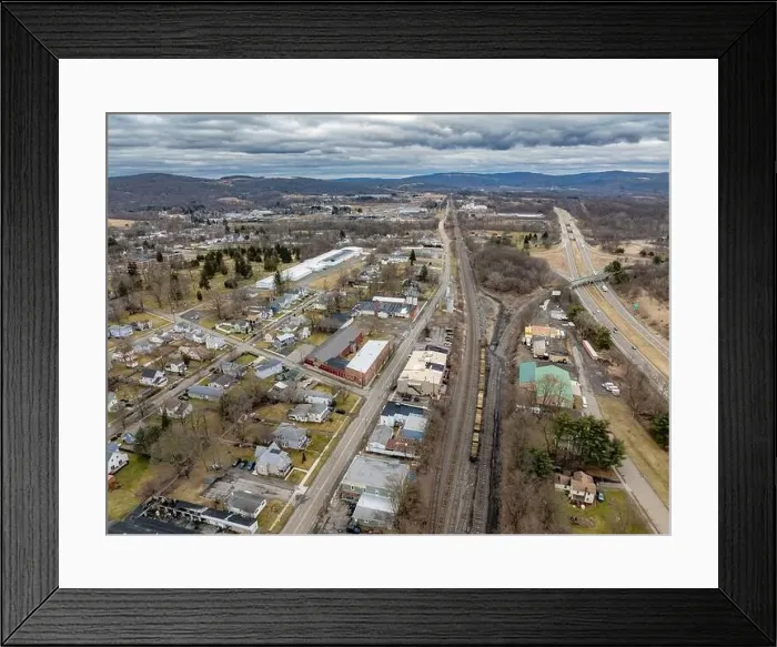 Framed Print : Waverly, NY, USA - 03-03-2024 - Cloudy winter aerial image of the downtown area in the Village of Waverly, NY Framed Print : Waverly, NY, USA - 03-03-2024 - Cloudy winter aerial image of the downtown area in the Village of Waverly, NY