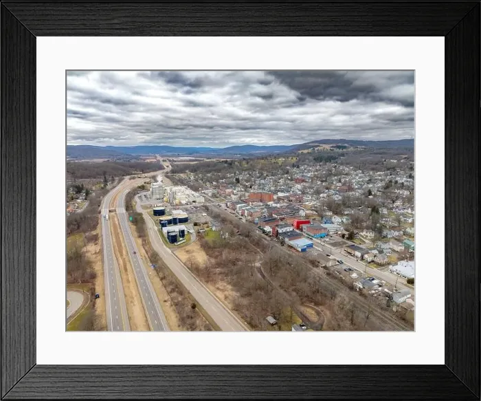Framed Print : Waverly, NY, USA - 03-03-2024 - Cloudy winter aerial image of the downtown area in the Village of Waverly, NY Framed Print : Waverly, NY, USA - 03-03-2024 - Cloudy winter aerial image of the downtown area in the Village of Waverly, NY