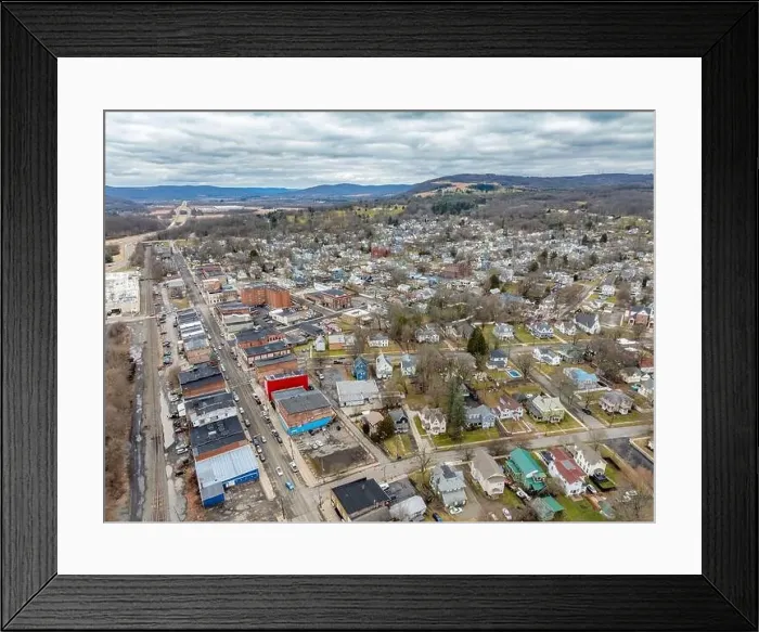Framed Print : Waverly, NY, USA - 03-03-2024 - Cloudy winter aerial image of the downtown area in the Village of Waverly, NY Framed Print : Waverly, NY, USA - 03-03-2024 - Cloudy winter aerial image of the downtown area in the Village of Waverly, NY