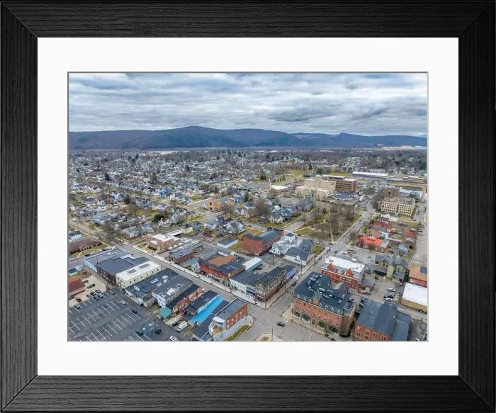 Framed Print : Sayre, PA, USA - 03-03-2024 - Cloudy winter aerial image of the downtown area in the City of Sayre, PA Framed Print : Sayre, PA, USA - 03-03-2024 - Cloudy winter aerial image of the downtown area in the City of Sayre, PA