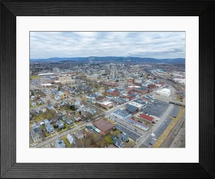 Framed Print : Sayre, PA, USA - 03-03-2024 - Cloudy winter aerial image of the downtown area in the City of Sayre, PA Framed Print : Sayre, PA, USA - 03-03-2024 - Cloudy winter aerial image of the downtown area in the City of Sayre, PA
