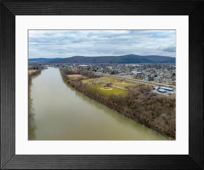 Framed Print : Sayre, PA, USA - 03-03-2024 - Cloudy winter aerial image of the downtown area in the City of Sayre, PA Framed Print : Sayre, PA, USA - 03-03-2024 - Cloudy winter aerial image of the downtown area in the City of Sayre, PA