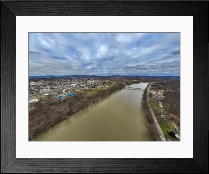 Framed Print : Sayre, PA, USA - 03-03-2024 - Cloudy winter aerial image of the downtown area in the City of Sayre, PA
