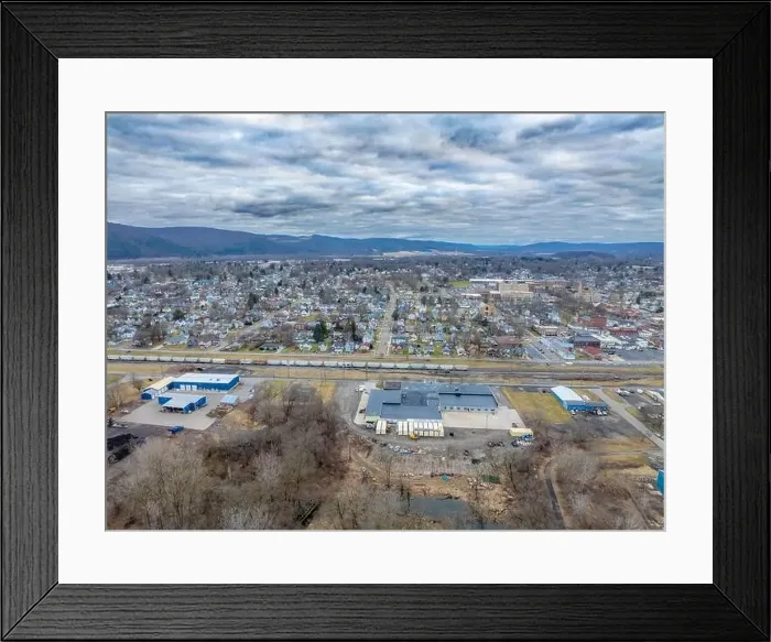 Framed Print : Sayre, PA, USA - 03-03-2024 - Cloudy winter aerial image of the downtown area in the City of Sayre, PA Framed Print : Sayre, PA, USA - 03-03-2024 - Cloudy winter aerial image of the downtown area in the City of Sayre, PA