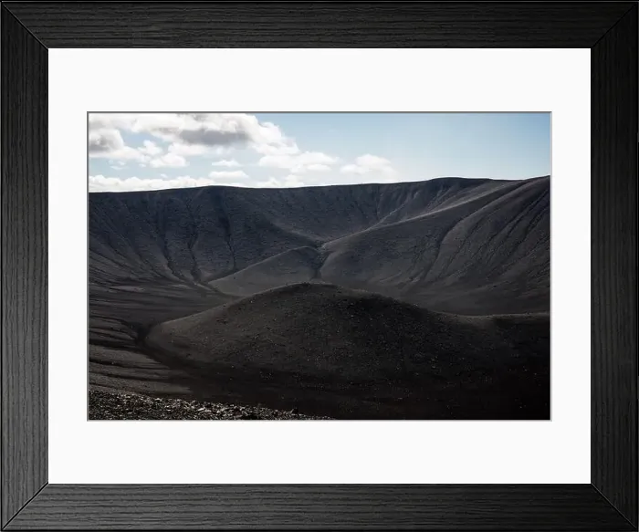Framed Print : Majestic view of an erupted volcano crater with black sand and scenic landscape in the background Framed Print : Majestic view of an erupted volcano crater with black sand and scenic landscape in the background
