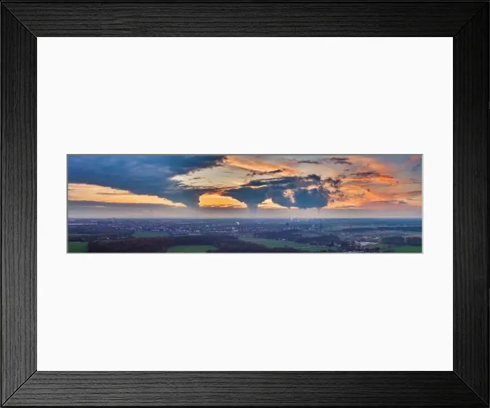 Framed Print : Drone image of the evening sky of the German industrial region of the Ruhr with several chimneys emitting large Framed Print : Drone image of the evening sky of the German industrial region of the Ruhr with several chimneys emitting large