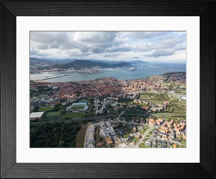 Framed Print : A drone captures the sprawling cityscape featuring modern buildings Framed Print : A drone captures the sprawling cityscape featuring modern buildings