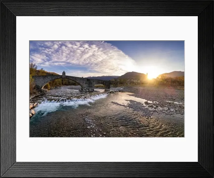 Framed Print : Aerial view of Bobbio town and Gobbo Bridge of Devil at sunset. Trebbia Valley, Emilia Romagna, Piacenza, Italy Framed Print : Aerial view of Bobbio town and Gobbo Bridge of Devil at sunset. Trebbia Valley, Emilia Romagna, Piacenza, Italy