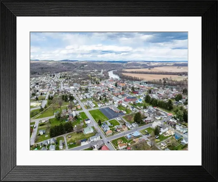 Framed Print : Jersey Shore, PA, USA - 03-17-2024 - Cloudy winter  /  spring aerial image of the borough