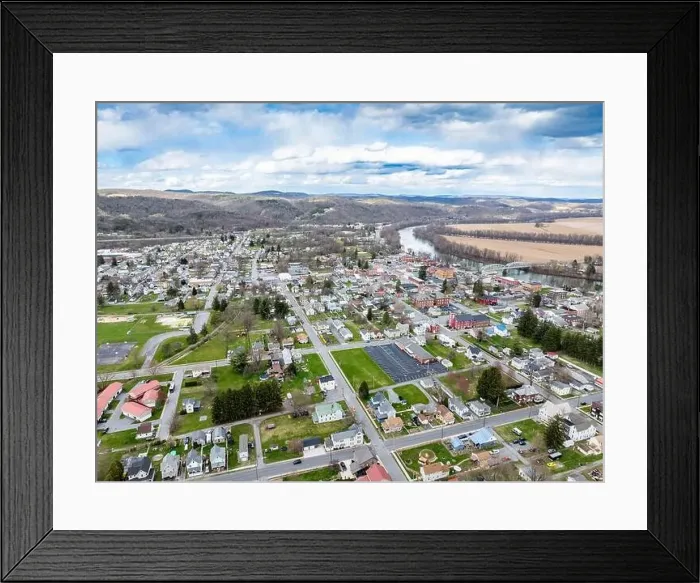 Framed Print : Jersey Shore, PA, USA - 03-17-2024 - Cloudy winter  /  spring aerial image of the borough