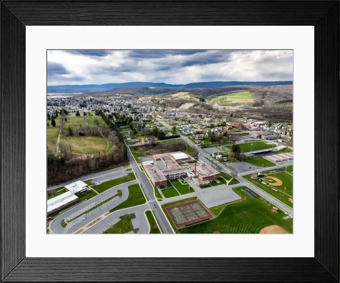 Framed Print : Jersey Shore, PA, USA - 03-17-2024 - Cloudy winter  /  spring aerial image of the borough