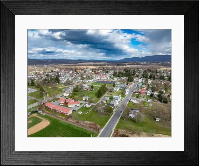 Framed Print : Jersey Shore, PA, USA - 03-17-2024 - Cloudy winter  /  spring aerial image of the borough