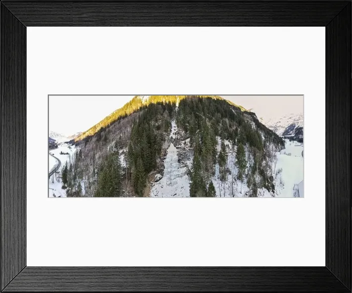 Framed Print : Drone view at a frozen waterfall at Engelberg on the Swiss alps Framed Print : Drone view at a frozen waterfall at Engelberg on the Swiss alps