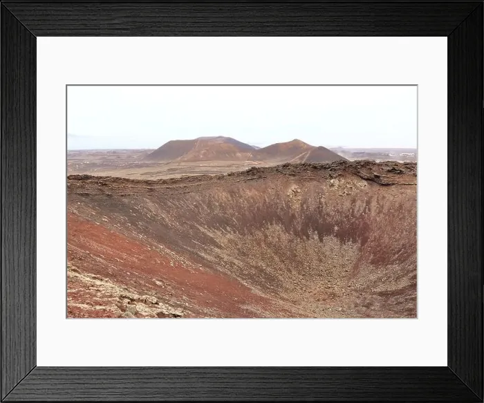 Framed Print : the Dramatic volcanic red deserted crater of Calderon Hondo volcano near to Corralejo, Fuerteventura. Canary Islands Framed Print : the Dramatic volcanic red deserted crater of Calderon Hondo volcano near to Corralejo, Fuerteventura. Canary Islands