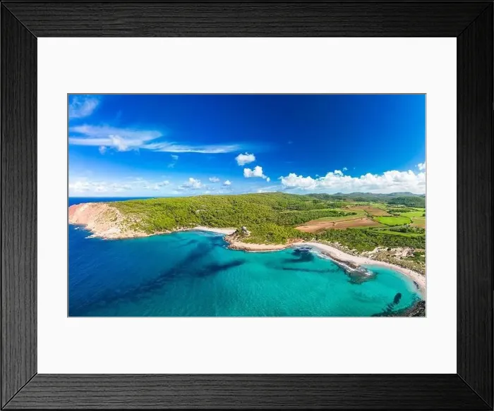 Framed Print : Aerial drone view of Menorca seascape at cala de Algariens, Spain Framed Print : Aerial drone view of Menorca seascape at cala de Algariens, Spain